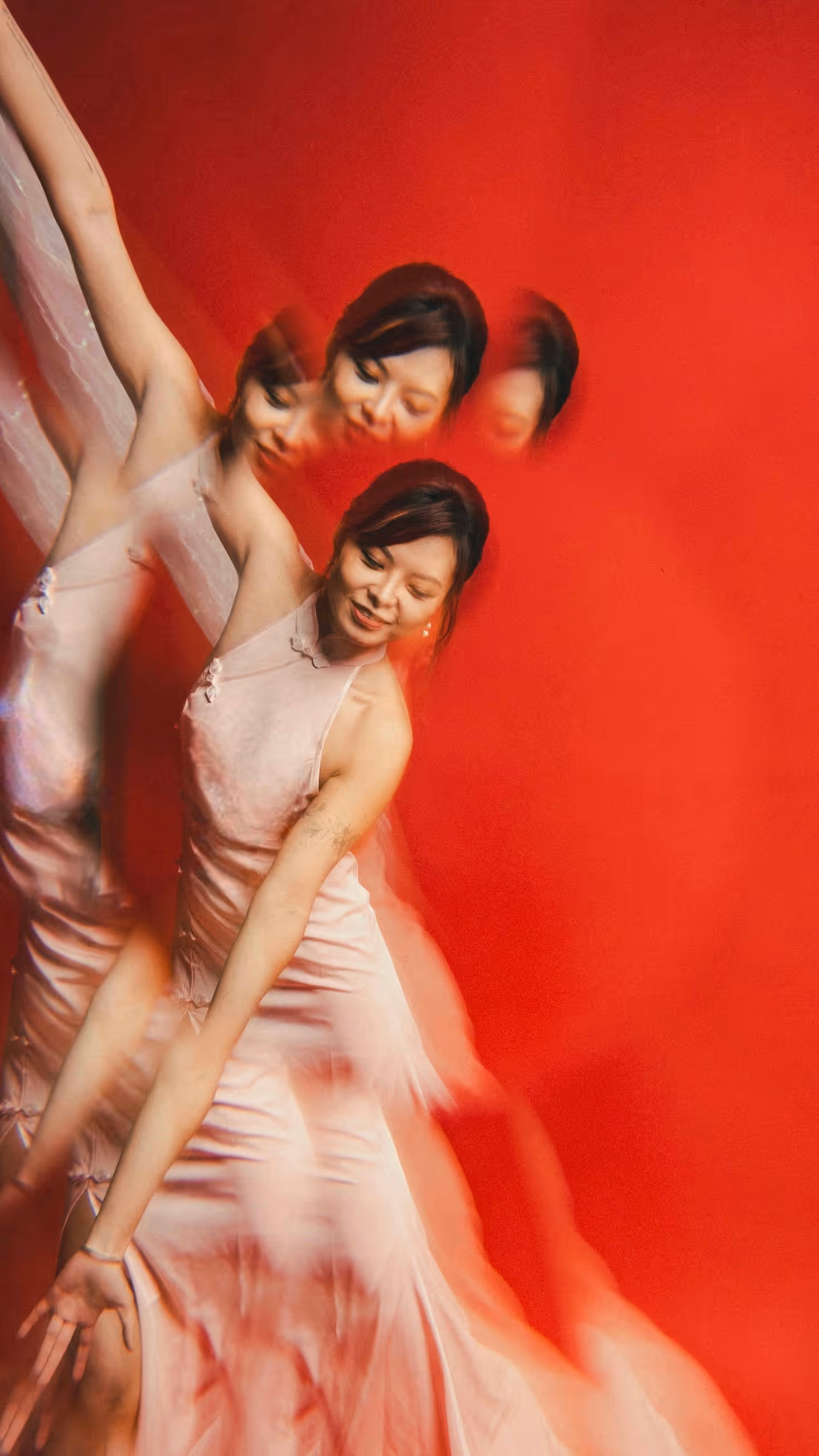 Wanli Wang practicing flow arts with silk fans and sword — frame 1