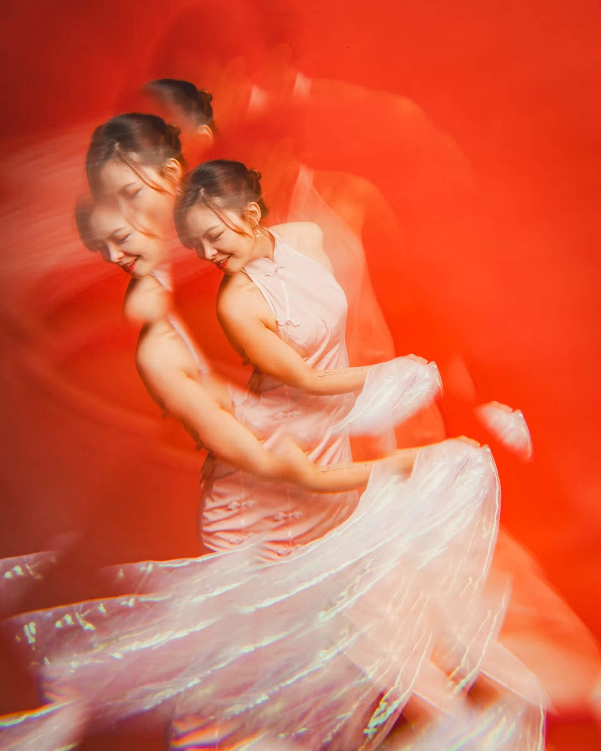 Wanli Wang practicing flow arts with silk fans and sword — frame 2