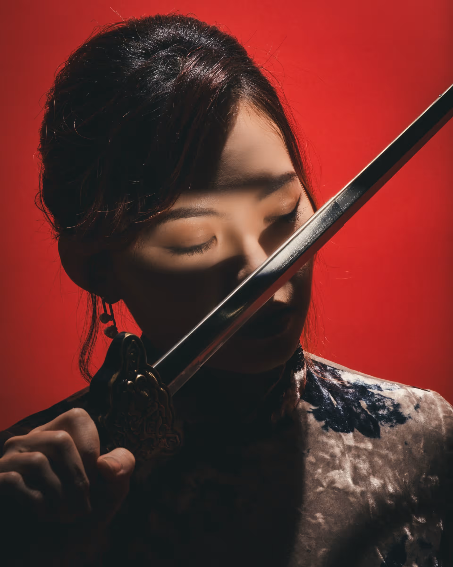 Wanli Wang practicing flow arts with silk fans and sword — frame 6