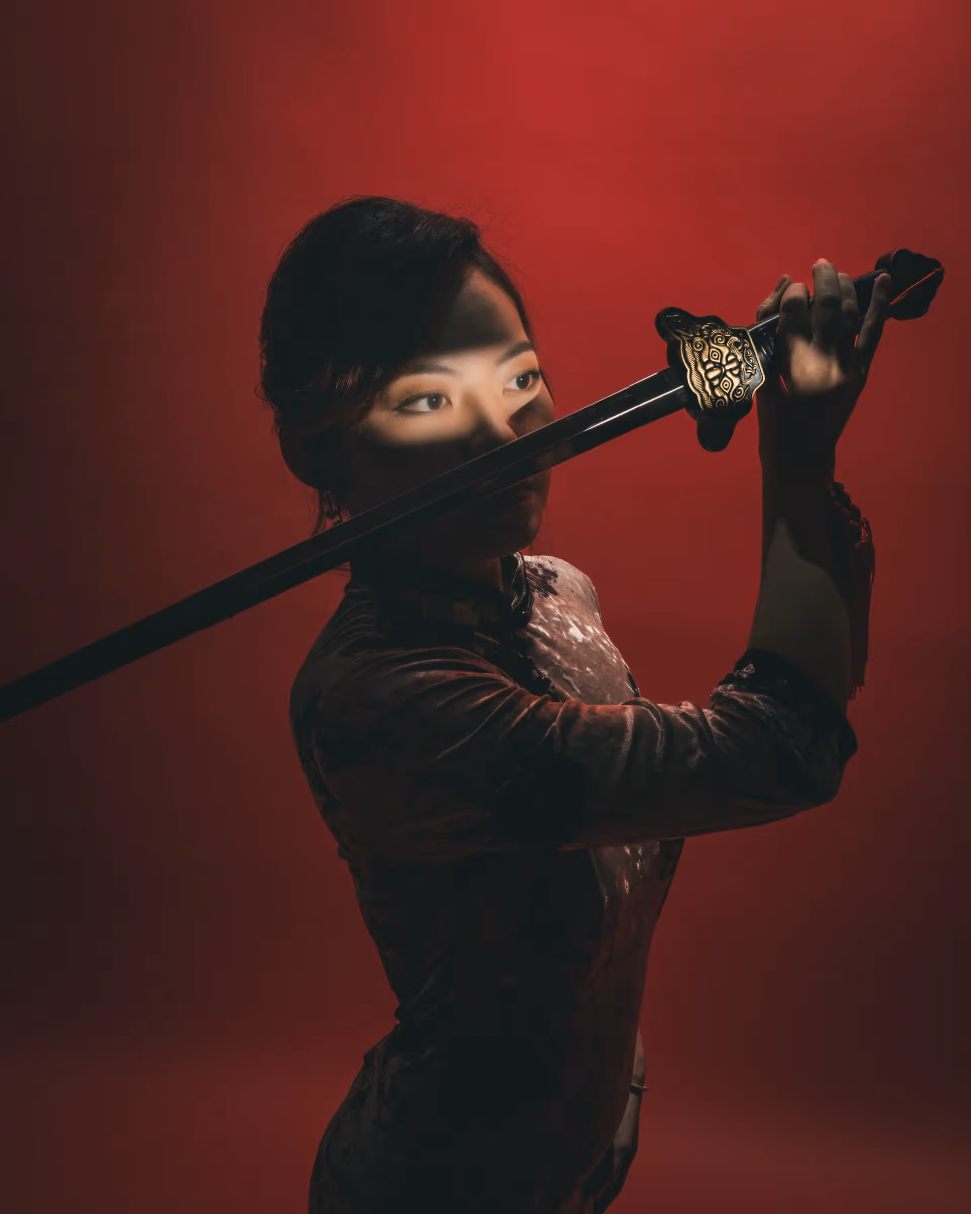 Wanli Wang practicing flow arts with silk fans and sword — frame 7