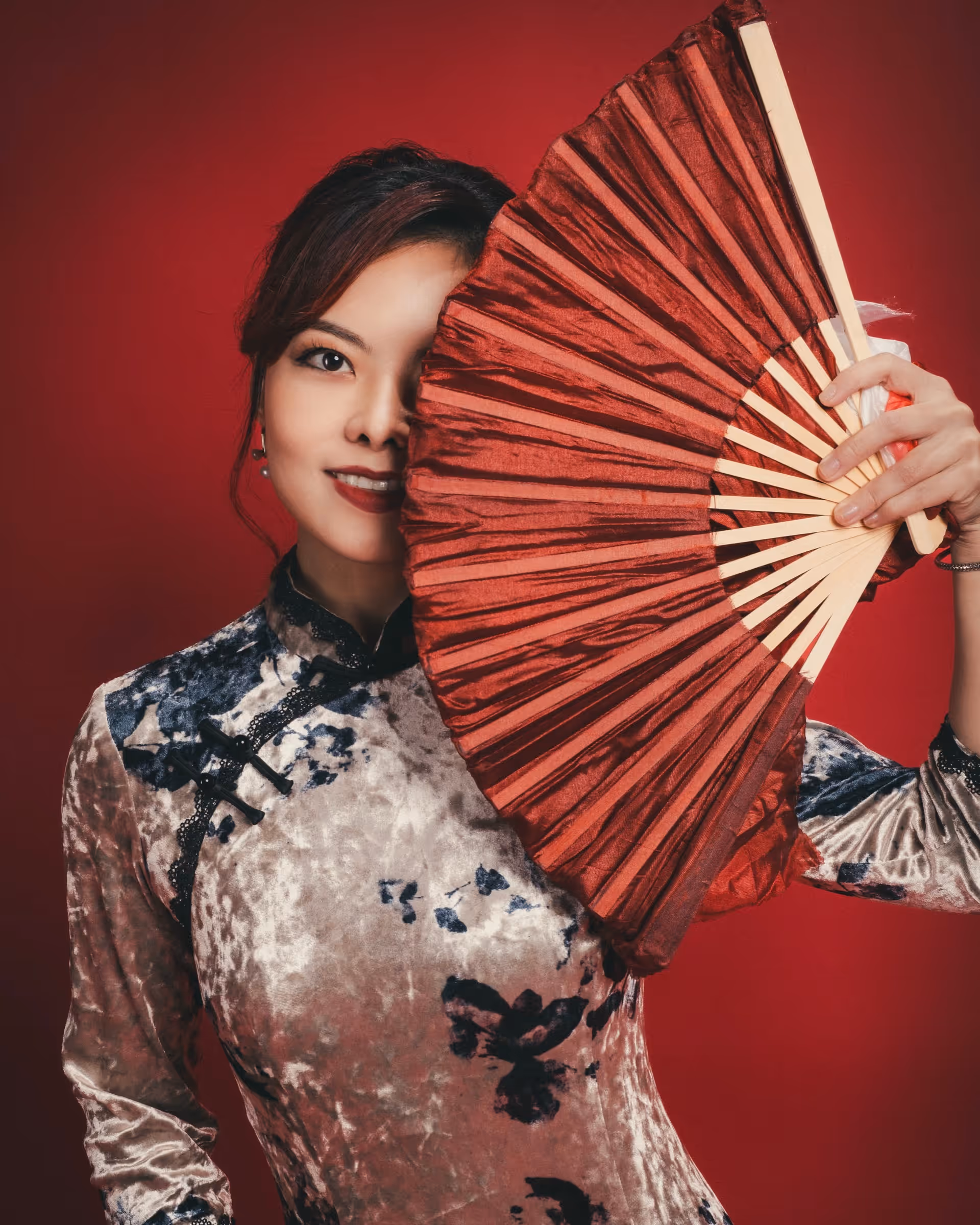 Wanli Wang practicing flow arts with silk fans and sword — frame 10
